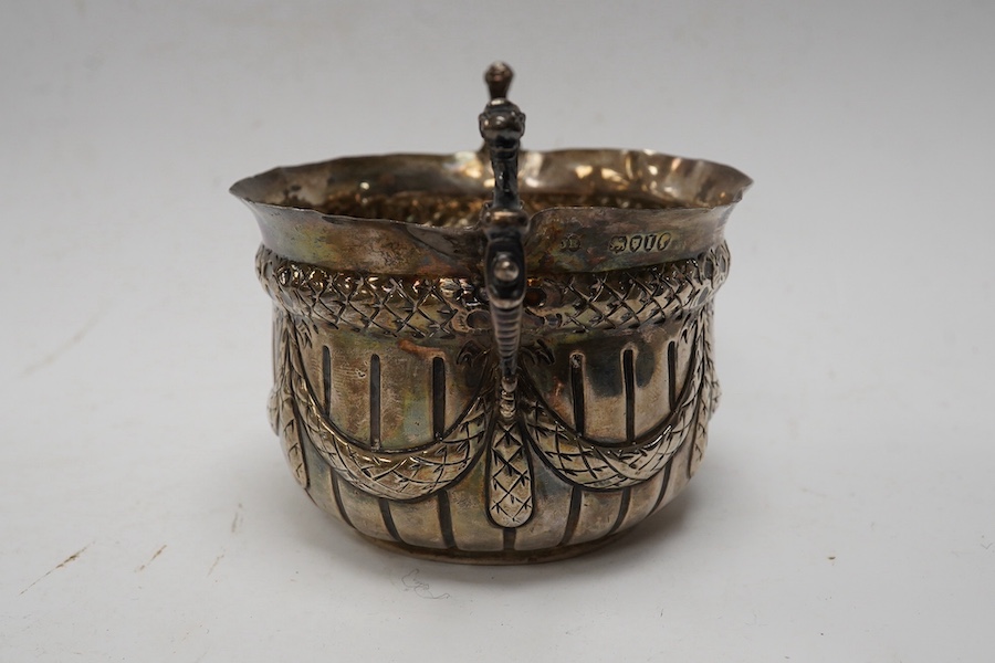 A late Victorian repousse silver porringer, maker JR, London 1884, height 82mm, 3.8oz. Condition - poor